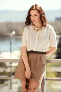 Pretty woman in summer dress outdoors